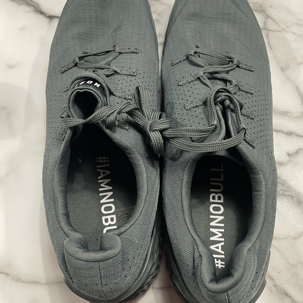 New used once size 16 mens grey ripstop Nobull runner shoes.